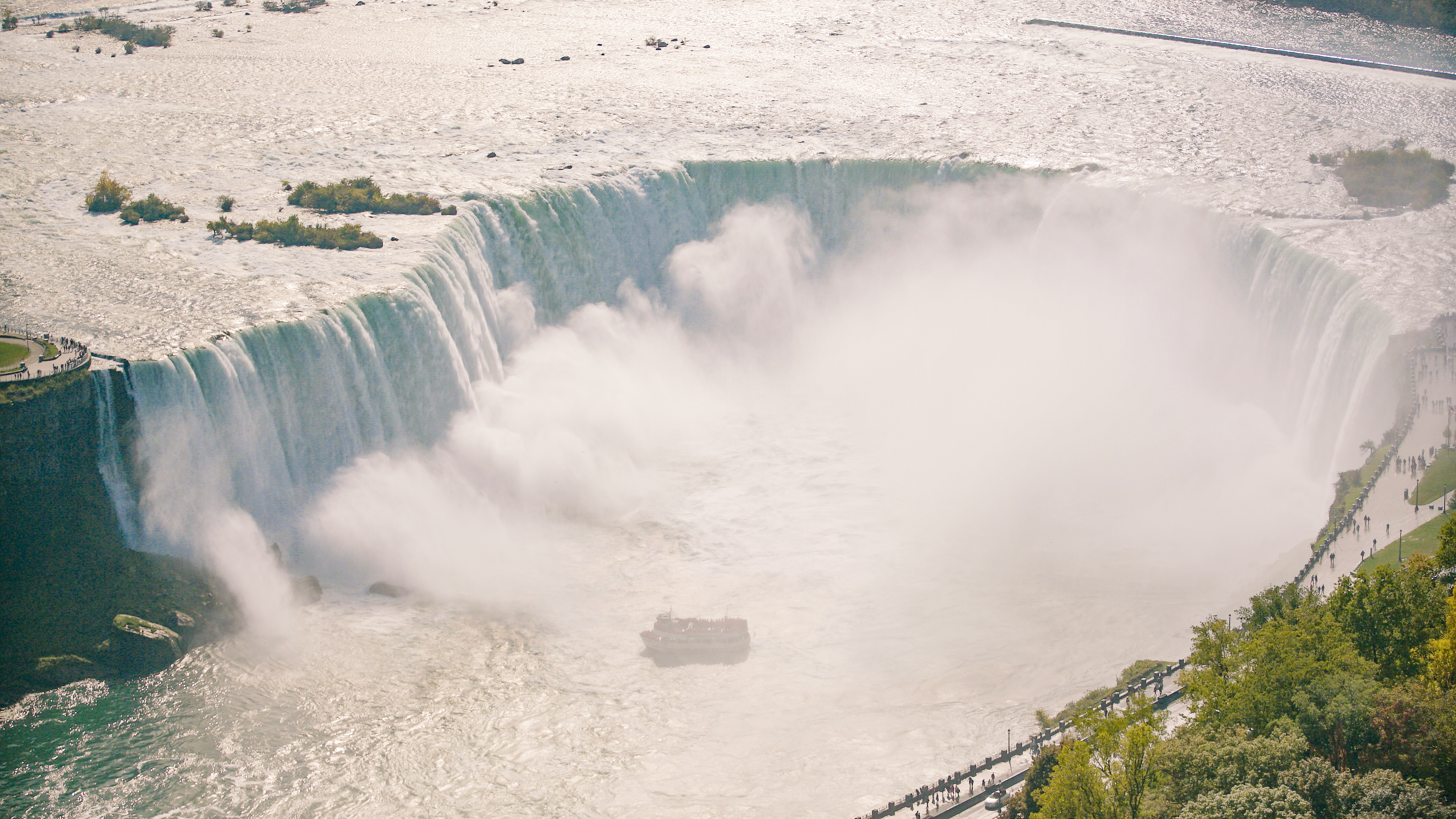 Maid of the mist under the falls Niagara Falls